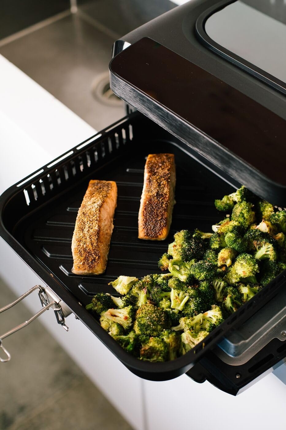 image:imageFrigidaire Electric Indoor Pizza Oven Reach Temperatures of 700F Stone Bake 12 Pizzas in Minutes Portable Countertop Oven with Air Fry and Bake Peel Included Model FRPO100BWith Pizza Peel Pizza Cutter